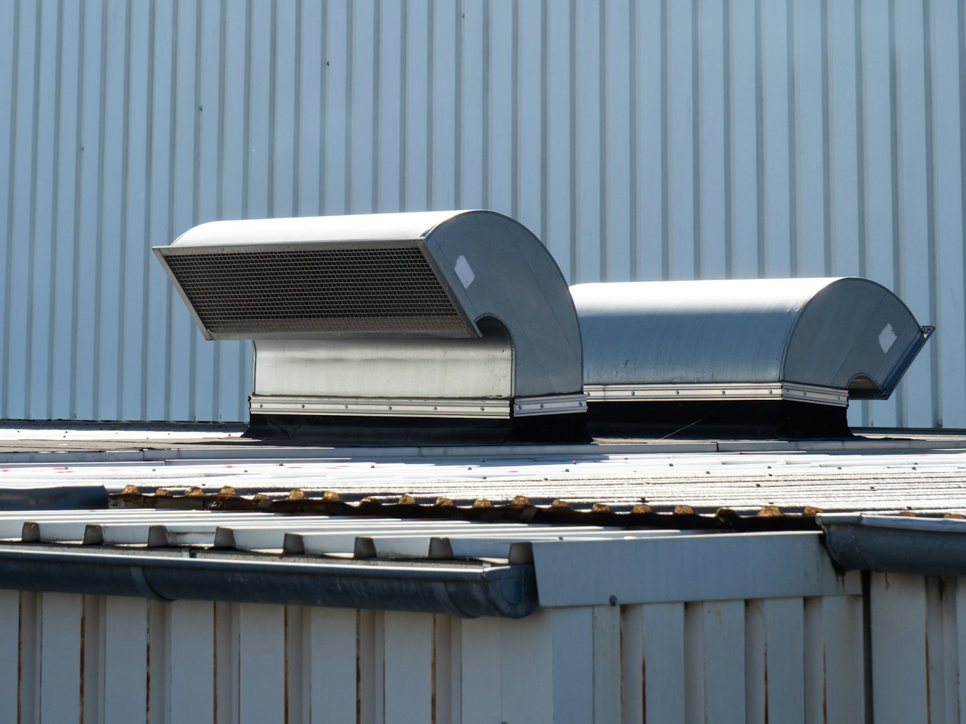Kitchen exhaust fans on a commercial roof