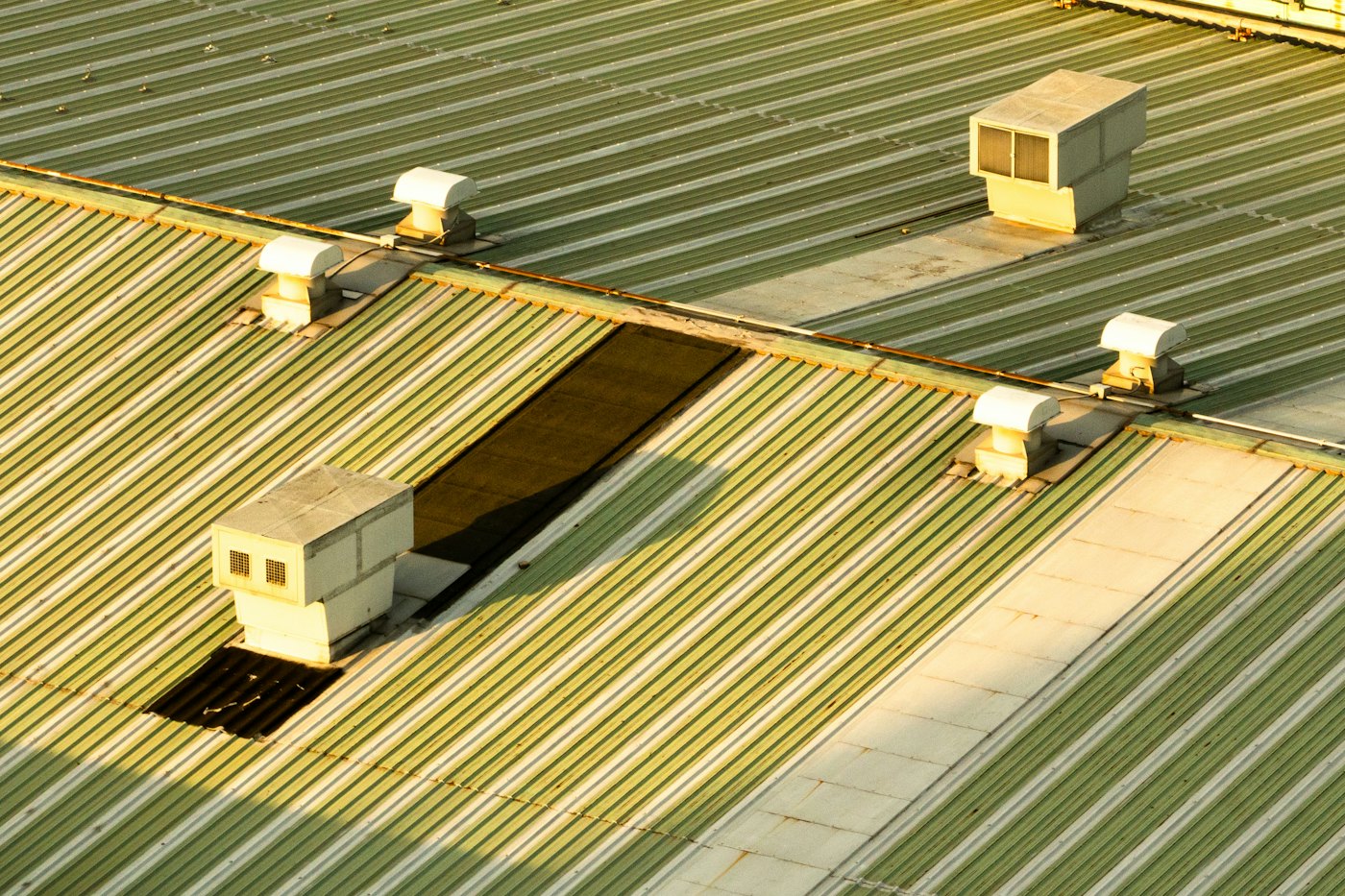 Ventilation units on a corrugated metal roof